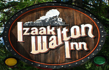 Picture of the Izaak Wlaton Inn sign on Highway 2 near Glacier National Park.