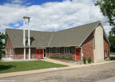 June picture of Denton United Methodist Church in Denton, Montana. Image is from the Denton Montana Picture Tour.