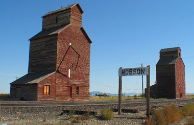 September picture of the two landmark Grain elevators in Hobson, Montana. Image is from the Hobson, Montana Picture Tour.