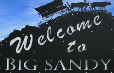 June picture of the Big Sandy Welcome Sign on Highway 87 in Big Sandy, Montana. Image is from the Big Sandy, Montana Picture Tour.