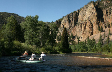 June picture of a drift boat on Upper Rock Creek west of Missoula, Montana. Image is from the Rock Creek Picture Tour.