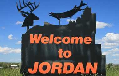 June picture of the Jordan, Montana Welcome Sign on Highway 200. Image is from the Jordan, Montana Picture Tour.