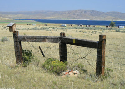 July picture of the Lone Tree Campground and fence on the Clark Canyon Reservoir. Image is from the Clark Canyon Reservoir Picture Tour.