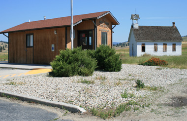 July picture of the Sula, Montana US Post Office and nearby church. Image is from the Sula, Montana Picture Tour.