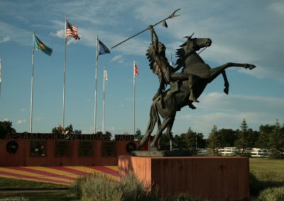 June picture of the Warrior Statue in the Apsaalooke Veterans Park in Crow Agency, Montana. Image is from the Crow Agency, Montana Picture Tour.