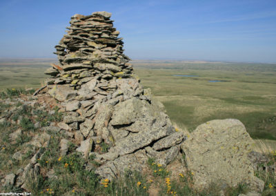 June picture of the second ancient rock cairn you pass as you hike to the summit of Gold Butte in the Sweet Grass Hills Image is from the Sweet Grass Hills Montana Picture Tour.