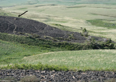 June picture of the camouflaged Eagle Catch. Watch for it as you pass as you hike to the summit of Gold Butte in the Sweet Grass Hills Image is from the Sweet Grass Hills Montana Picture Tour.