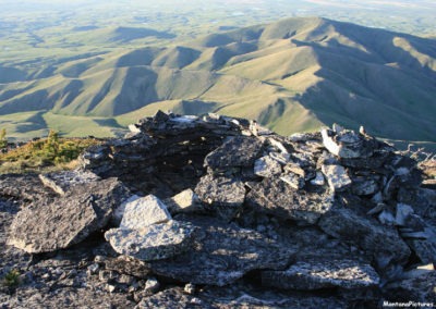 June sunset picture of the camouflaged Eagle Catch on the summit of Gold Butte in the Sweet Grass Hills Image is from the Sweet Grass Hills Montana Picture Tour.