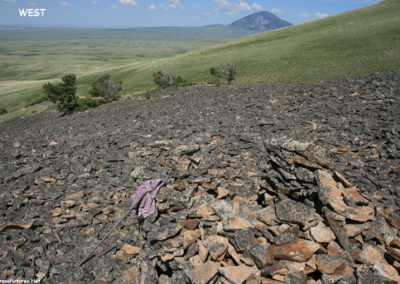 June picture of West Butte and the rock structure known as an Eagle Catch. Watch for it as you pass as you hike to the summit of Gold Butte in the Sweet Grass Hills Image is from the Sweet Grass Hills Montana Picture Tour.