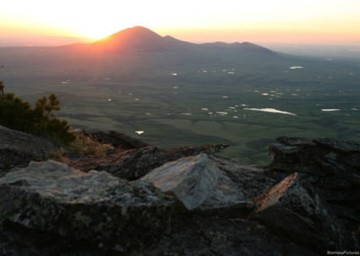 The sunset view from Gold Butte reveal all the bodies of water scattered across the land. Image is from the Sweet Grass Hills Montana Picture Tour.