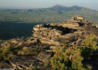 June sunset picture of the rock structure on the summit of Gold Butte (6512 feet) in the Sweet Grass Hills. Image is from the Sweet Grass Hills Montana Picture Tour.