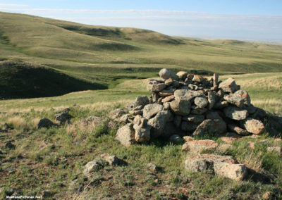 June picture of the first ancient rock cairn you pass as you hike to the summit of Gold Butte in the Sweet Grass Hills Image is from the Sweet Grass Hills Montana Picture Tour.