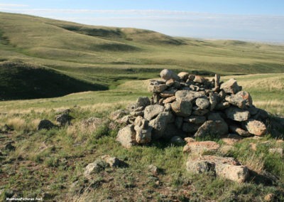 June picture of the first ancient rock cairn you pass as you hike to the summit of Gold Butte in the Sweet Grass Hills Image is from the Sweet Grass Hills Montana Picture Tour.