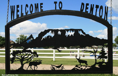 June picture of the Denton Montana Welcome sign on Montana Highway 81. Image is from the Denton Montana Picture Tour.