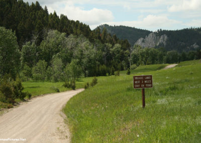 June picture of cliffs along Forest Service Road 211 in the Castle Mountains. Image is from the Castle Town Montana Picture Tour.