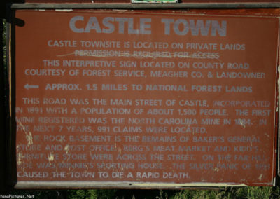 June picture of the Castle Town Montana Historical Marker on Forest Service Road 211 in the Castle Mountains. Image is from the Castle Town Montana Picture Tour.