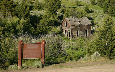 June picture of the Castle Town Montana Historical Marker on Forest Service Road 211 in Central Montana. Image is from the Castle Town Montana Picture Tour.