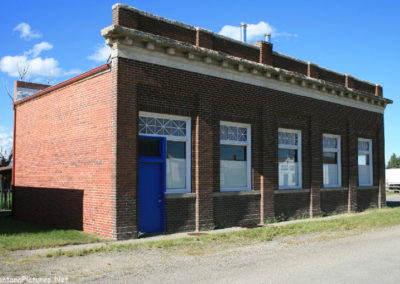 June picture of a former bank building in Martinsdale, Montana. Image is from the Martinsdale and Lennep Town Montana Picture Tour.
