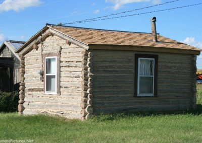 June picture of a Log Cabin in Martinsdale, Montana. Image is from the Martinsdale and Lennep Town Montana Picture Tour.
