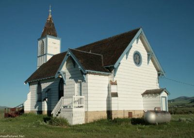 June picture of the west side of the Trinity Lutheran Church in Lennep, Montana. Image is from the Martinsdale and Lennep Town Montana Picture Tour.