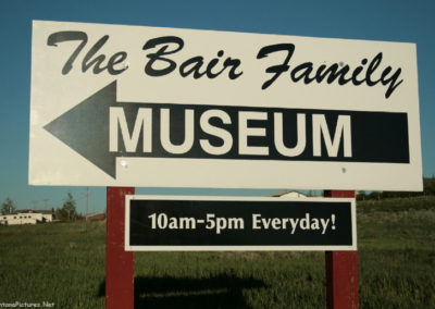 June picture of the the Bair Family Museum sign in Highway 294. Image is from the Martinsdale and Lennep Town Montana Picture Tour.