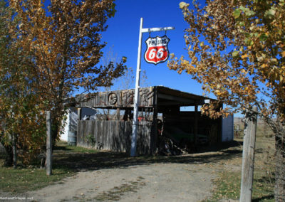 October picture of antique Gas Stations Signs near Simms, Montana. Image is from the Crown Butte Preserve & Simms Montana Picture Tour.
