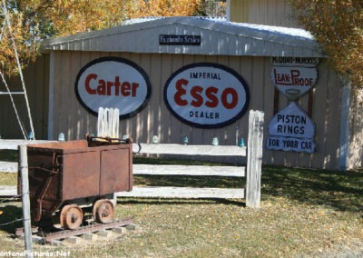 October morning picture of antique Gas Station signs near Simms, Montana. Image is from the Crown Butte Preserve & Simms Montana Picture Tour.
