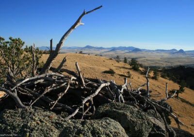 October picture of a Crown Butte landmark and Rocky Mountain Front. Image is from the Crown Butte Preserve & Simms Montana Picture Tour.