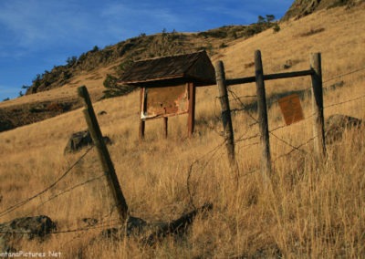 October picture of the vandalized Nature Conservancy information board near the summit of Crown Butte. Image is from the Crown Butte Preserve & Simms Montana Picture Tour.