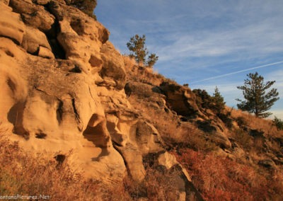 Golden sunlight reflecting off sandstone boulders near the summit of Crown Butte. Image is from the Crown Butte Preserve & Simms Montana Picture Tour.