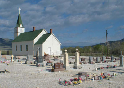 June picture of the St John Evangelist Catholic Church of the North Boulder Valley Cemetery. Image is from the Boulder Montana Picture Tour.