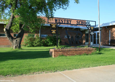 A June picture of the Westby grade school in Westby, Montana. Image is from the Westby Montana Picture Tour.