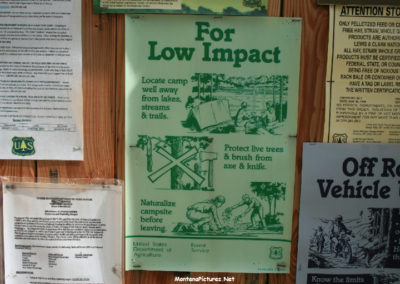 June 2018 picture of a Low Impact Camping Poster found on the Sign Spring Creek Road FS274 near Checkerboard, Montana. Image is from the Checkerboard Montana Picture Tour.