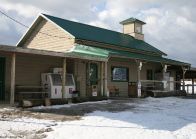 January 2019 picture of the Blue Nugget Bar in Sapphire Village, Montana. Image is from the Checkerboard Montana Picture Tour.
