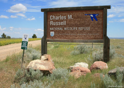 June picture of the CMR Wildlife Refuge Sign on the Crooked Creek Road along the Missouri River. Image is from the James Kipp Recreation Area Picture Tour.