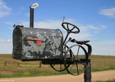 June picture of an artistic US Mail Box on the Crooked Creek Road in the Charles M Russell National Wildlife Refuge. Image is from the James Kipp Recreation Area Picture Tour.