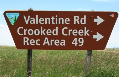 Picture of the Crooked Creek Recreation Area sign on Highway 19 near Roy, Montana. Image is from the Fort Peck Lake Montana Picture Tour.