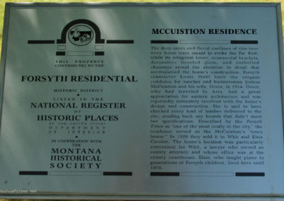 June picture of the McCuistion Historical sign in the Forsyth Montana Historic Residential District. Image is from the Forsyth Montana Picture Tour.