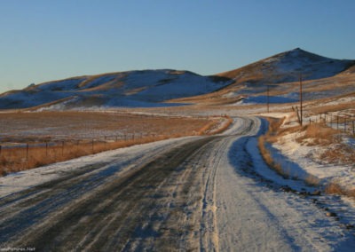 December picture of a snow covered Stearns Road. Image is from the Augusta Montana Picture Tour.