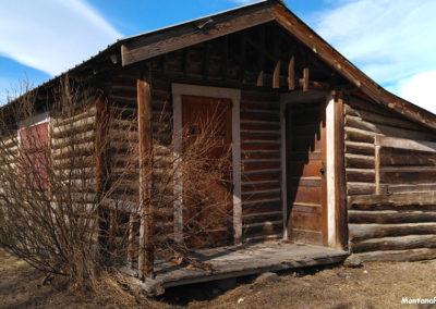 February picture of tiny log cabin in downtown Augusta. Image is from the Augusta Montana Picture Tour.