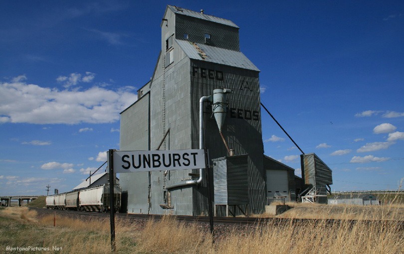 May picture of the Grain Elevators on the northeast side of Sunburst Montana. Image is from the Sunburst Montana Picture Tour.