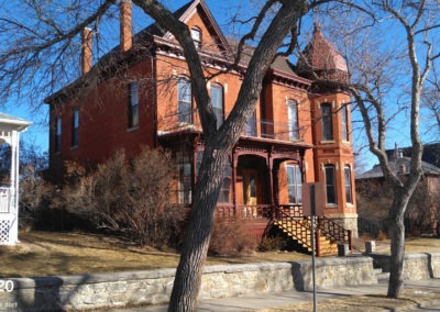 February picture of an ornate brick Home in the Helena Montana Mansion District. Image is from the Helena Montana Winter Picture Tour.
