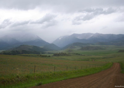 June picture of a cloud covered Crazy Mountains near the town of Two Dot. Image is from the Two Dot Montana Picture Tour.