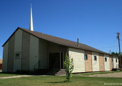 July picture of the Seventh Day Adventist Church. Image is from the Shelby Montana Picture Tour.