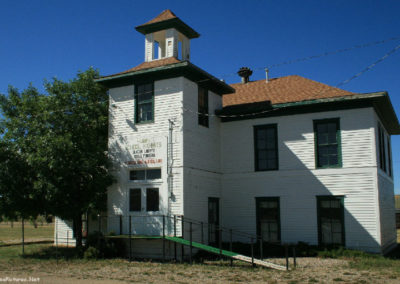 July close-up of the Old School House At The Marias Fair. Image is from the Shelby Montana Picture Tour.