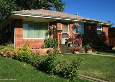 July picture of residential flower garden in Shelby. Image is from the Shelby Montana Picture Tour.