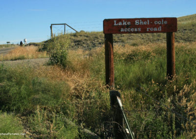 July picture of the Lake Shel-oole Sign outside Shelby. Image is from the Shelby Montana Picture Tour.