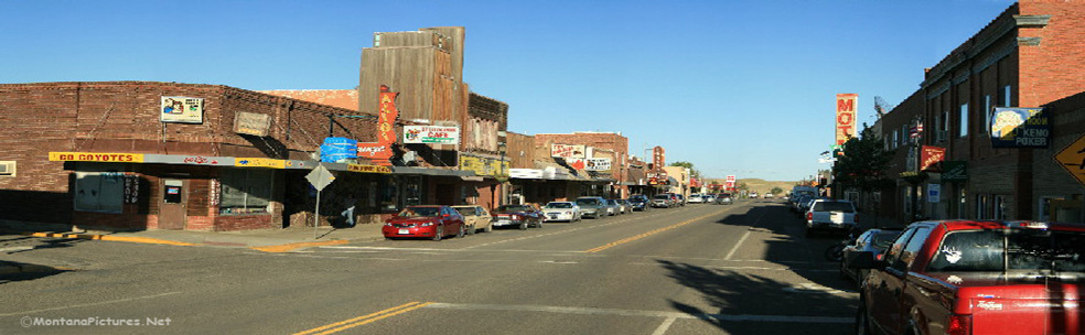 July evening panorama of Main Street in Shelby Montana. Image is from the Shelby Montana Picture Tour.