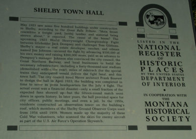 July picture of the Old Shelby Town Hall historical sign on Main St. Image is from the Shelby Montana Picture Tour.