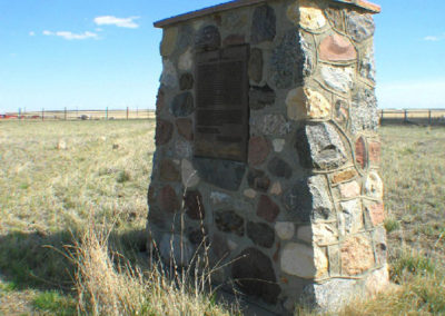 July picture of the Whoop Up Trail Monument on Highway 2. Image is from the Shelby Montana Picture Tour.